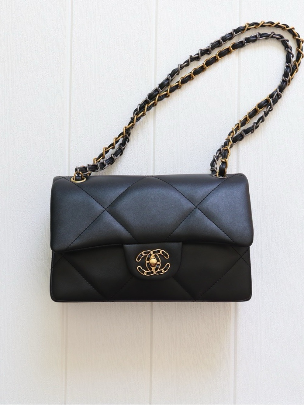CHANEL Black Quilted Leather Flap Bag with Gold-Tone Chain